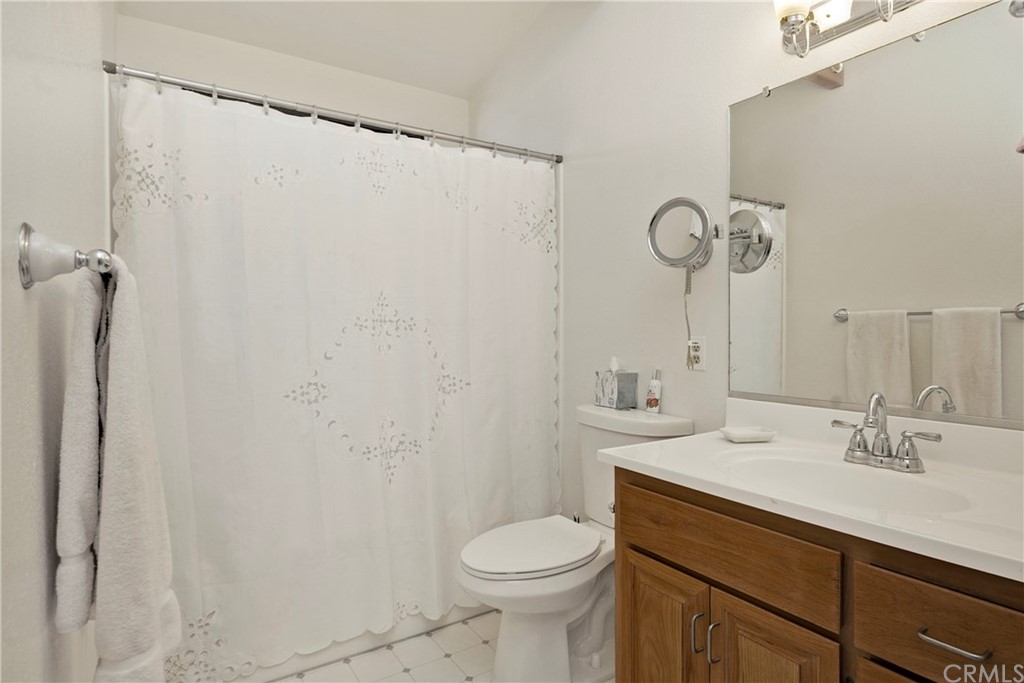 5191 Lake Boulevard Lower Lake, CA 95457 - Photo 16 of 44 a bathroom with a sink a toilet and shower