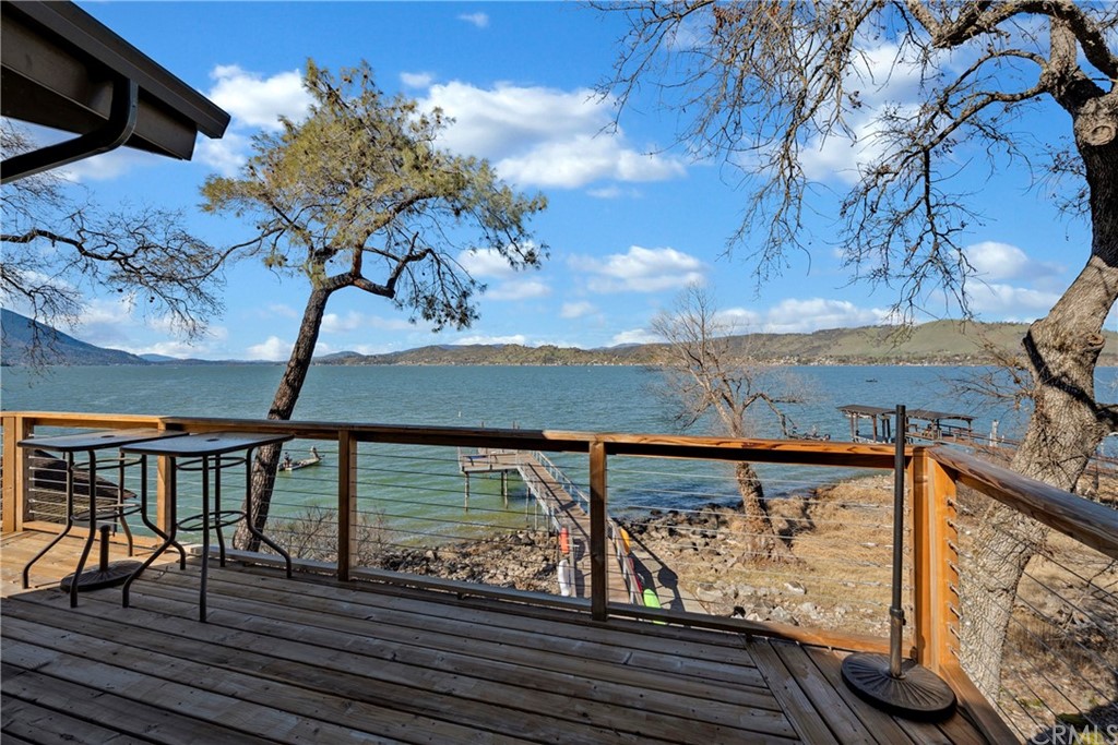 5191 Lake Boulevard Lower Lake, CA 95457 - Photo 25 of 44 a view of a balcony with wooden floor and iron fence