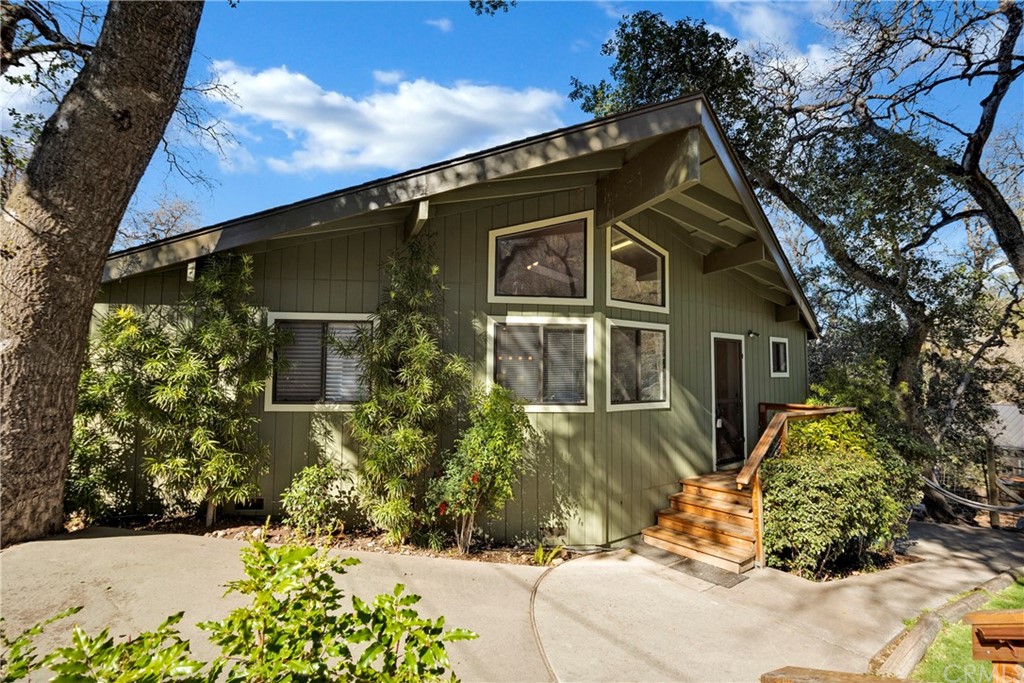 5191 Lake Boulevard Lower Lake, CA 95457 - Photo 39 of 44 a front view of a house with a yard