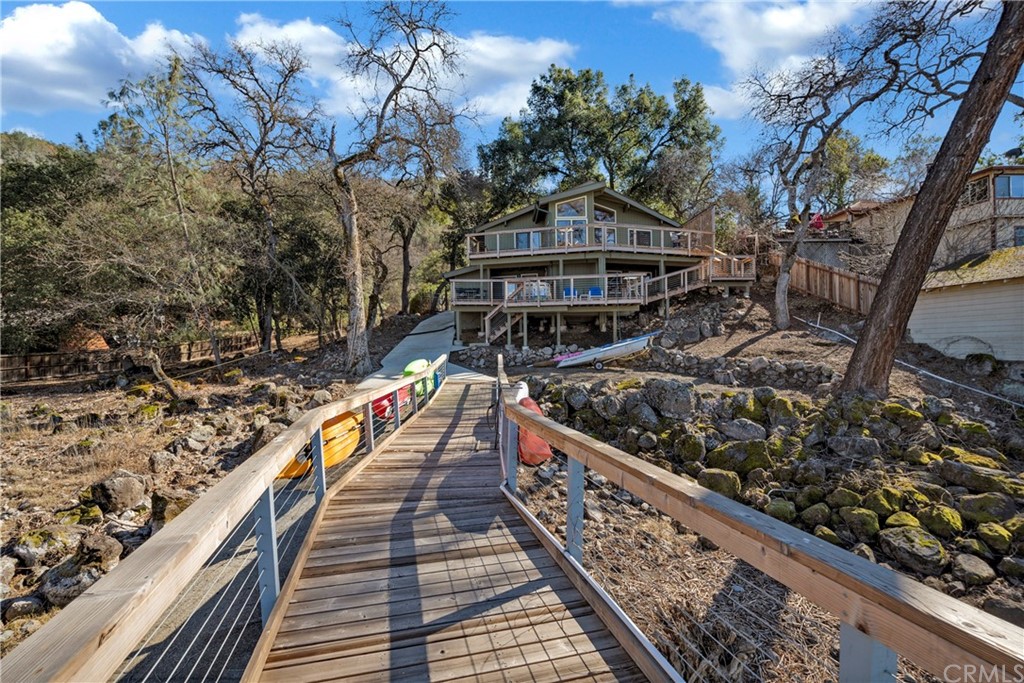 5191 Lake Boulevard Lower Lake, CA 95457 - Photo 4 of 44 a view of a pathway with a wrought iron fence