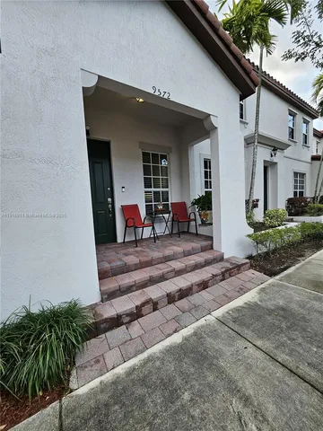 a view of a house with a patio