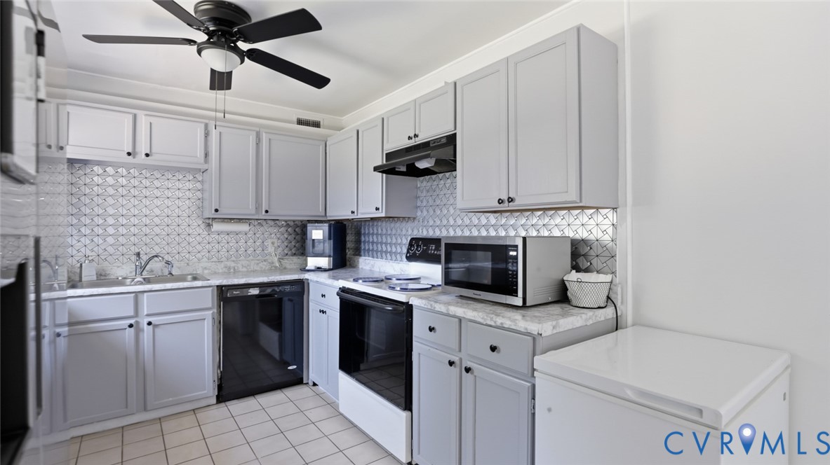 1310 Andover Road Henrico, VA 23229 - Photo 17 of 43 Kitchen featuring light gray cabinetry, white coun