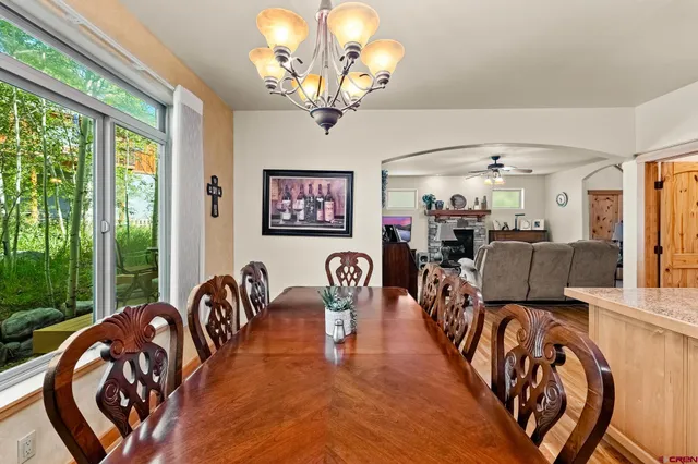 a view of a livingroom with furniture chandelier