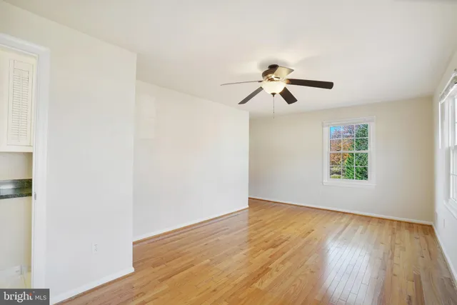 a bathroom with a shower and a toilet