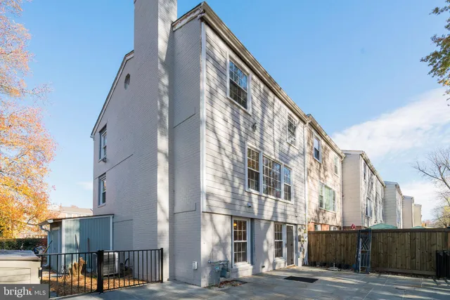 a view of a yard with trees