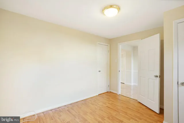 a spacious bathroom with a sink and a toilet