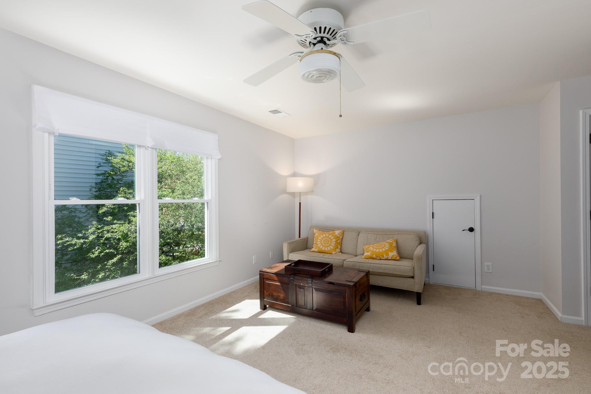 2815 Providence Spring Lane Charlotte, NC 28270 - Photo 22 of 42 a living room with furniture and a window