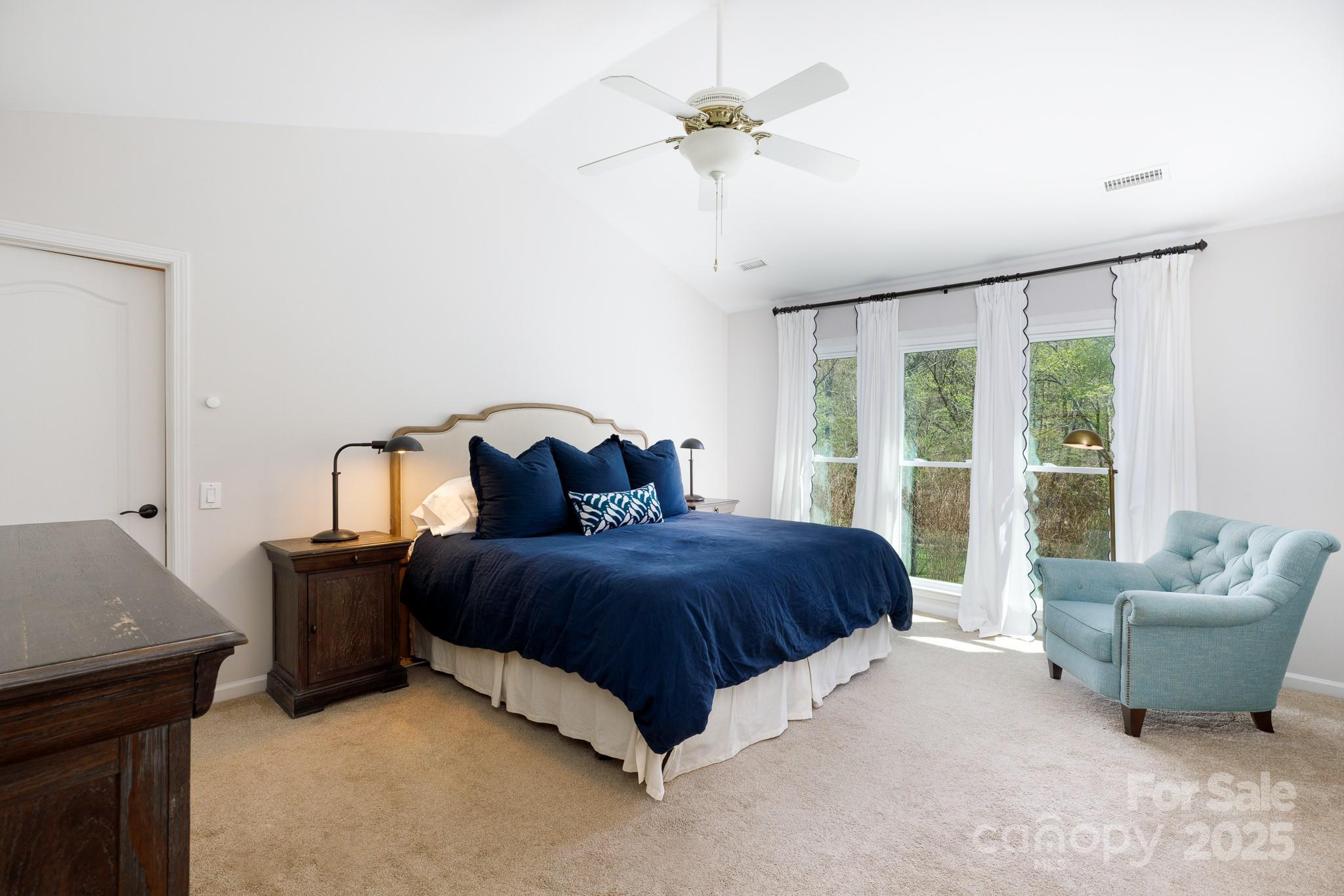 2815 Providence Spring Lane Charlotte, NC 28270 - Photo 26 of 42 a spacious bedroom with a bed and window