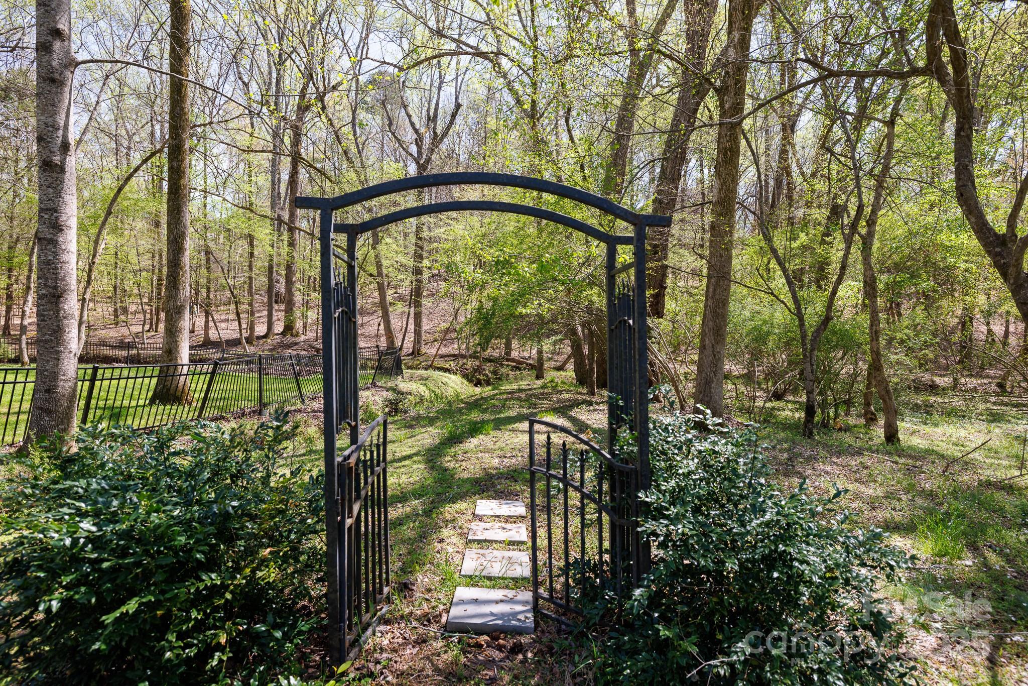 2815 Providence Spring Lane Charlotte, NC 28270 - Photo 39 of 42 a view of swimming pool with a yard