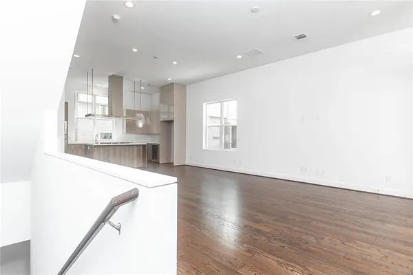 a view of kitchen with wooden floor