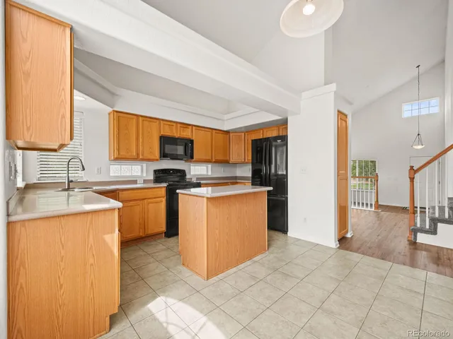 a bathroom with a sink toilet and a mirror