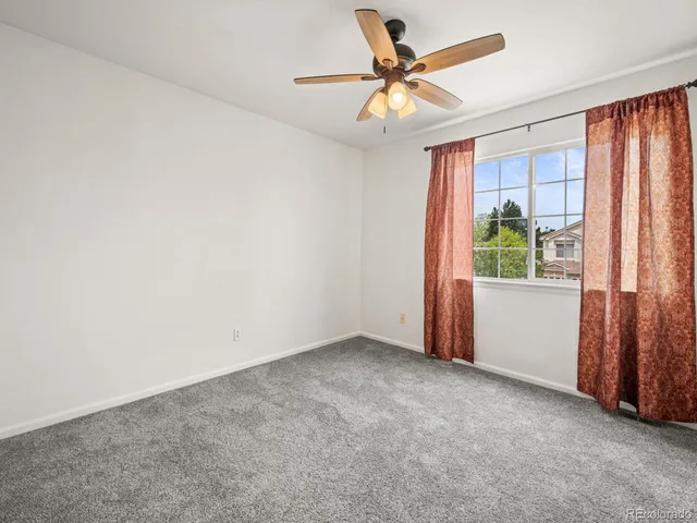 a view of a park with swings and slides