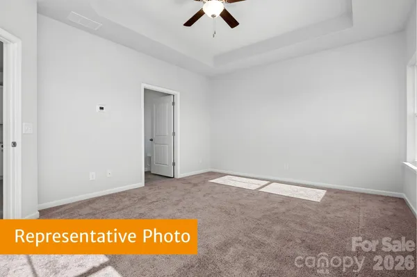 a bathroom with a sink a mirror and a shower