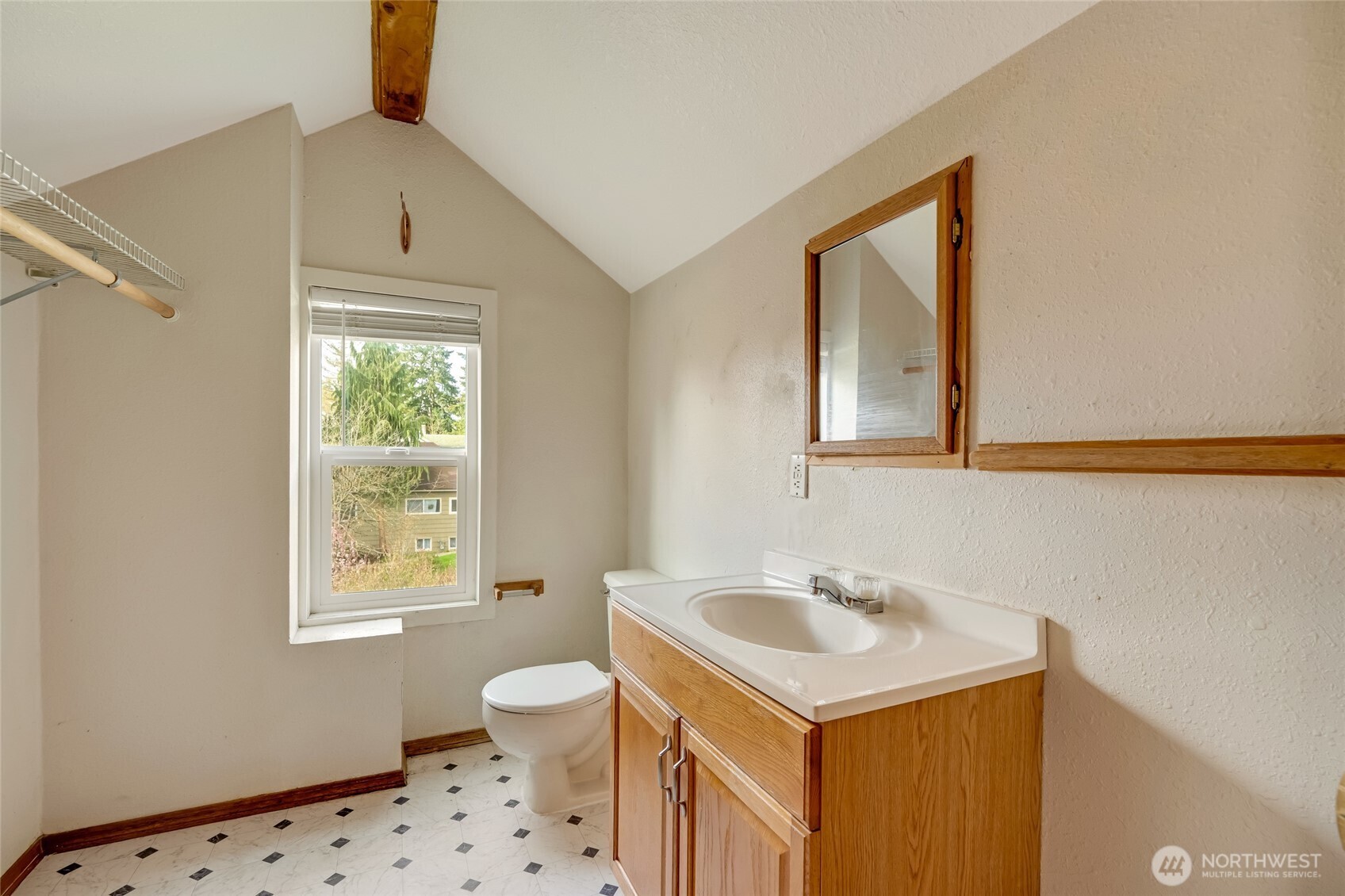 412 Southwest 4th Place Renton, WA 98057 - Photo 15 of 21 a bathroom with a sink a vanity and a toilet