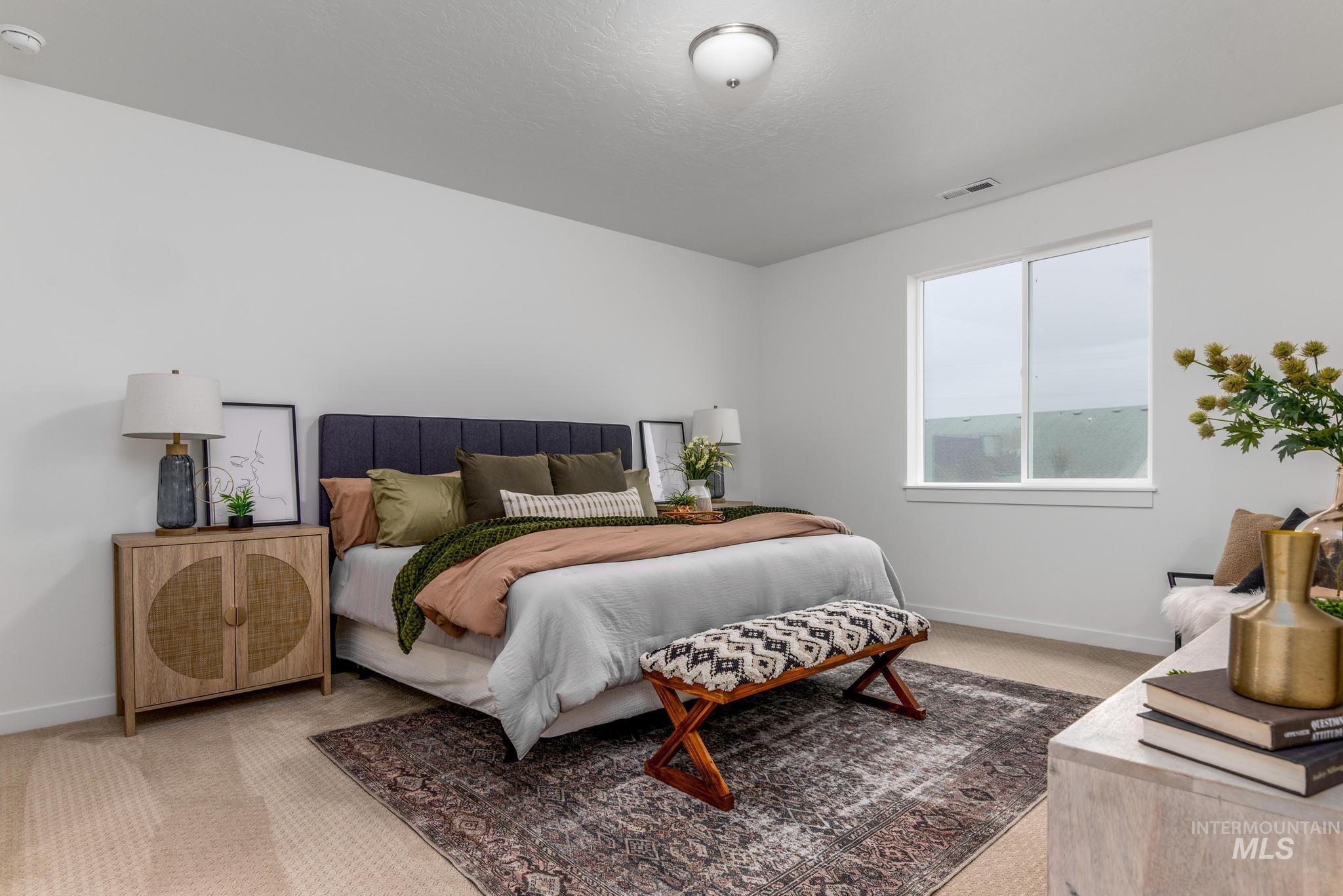 2087 West Gelding Street Middleton, ID 83644 - Photo 19 of 41 Bedroom with light carpet and baseboards