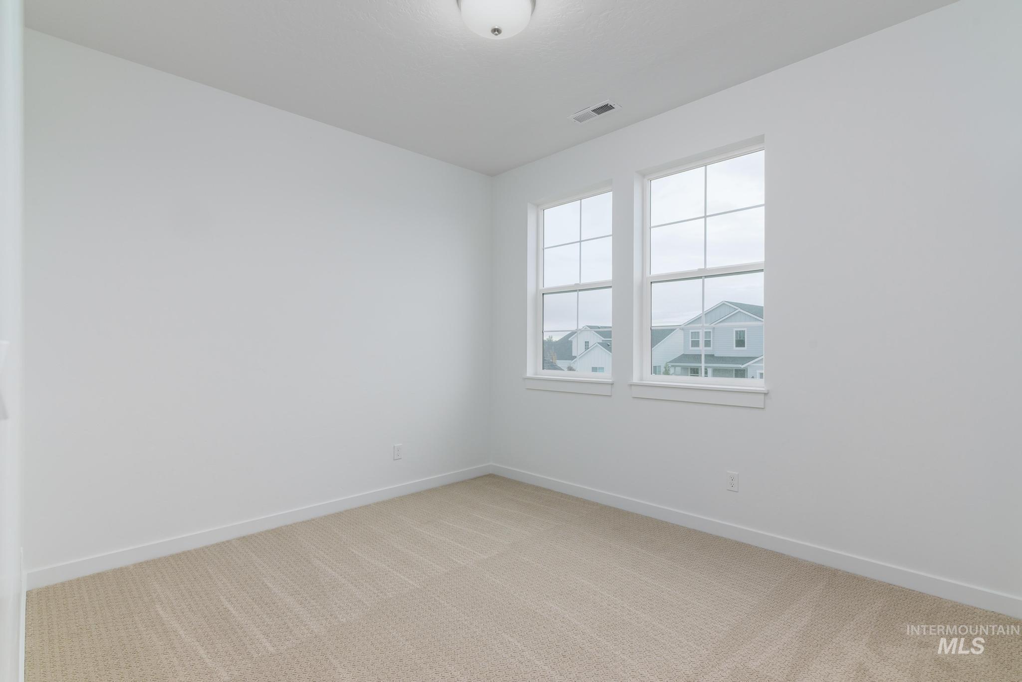 2087 West Gelding Street Middleton, ID 83644 - Photo 23 of 41 Unfurnished room with carpet floors and baseboards