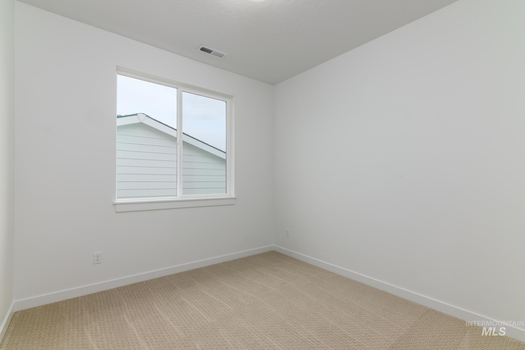 2087 West Gelding Street Middleton, ID 83644 - Photo 25 of 41 Spare room with carpet and baseboards