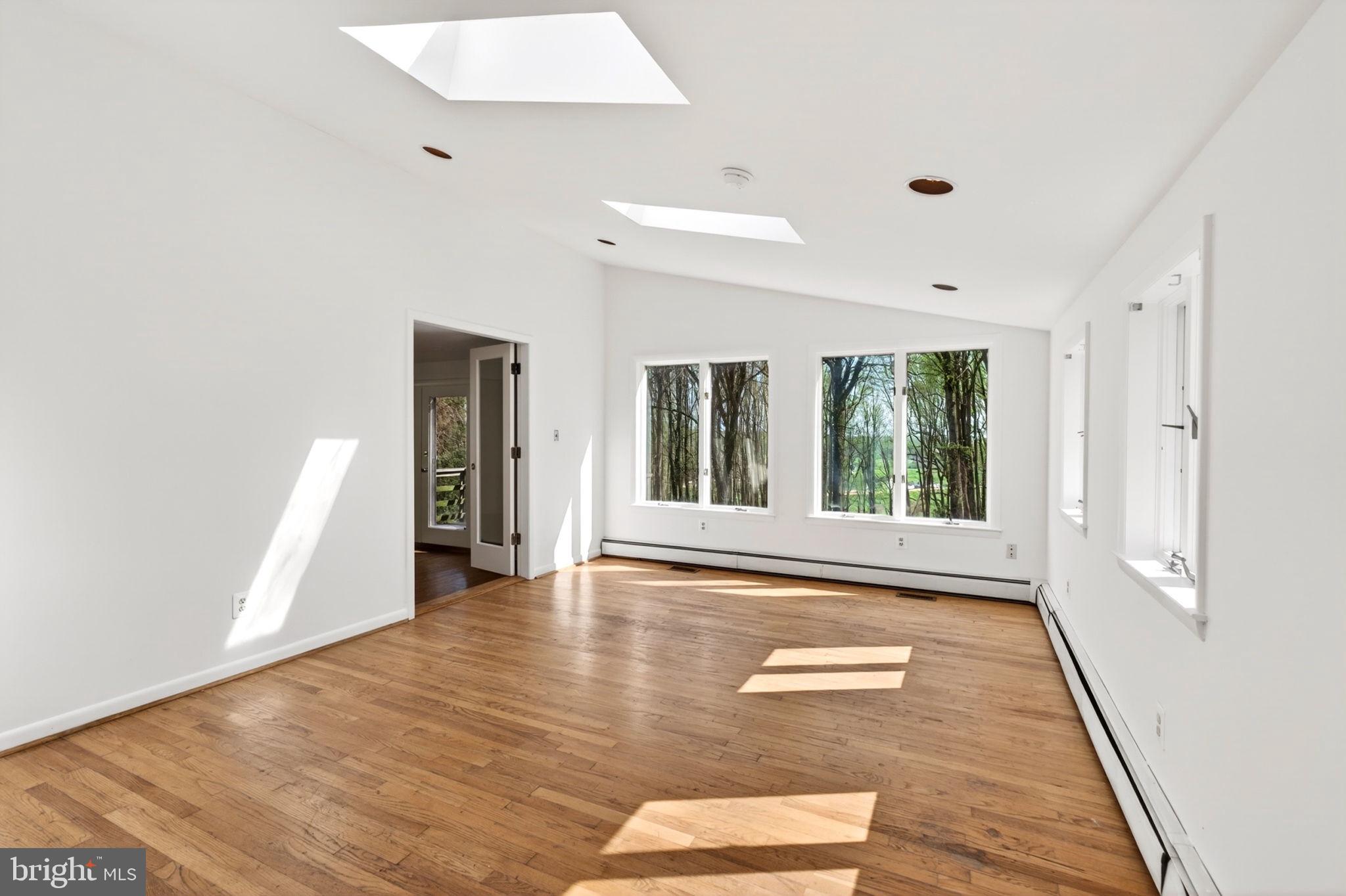 13009 Bottom Road Hydes, MD 21082 - Photo 32 of 97 Bright sitting room featuring skylights
