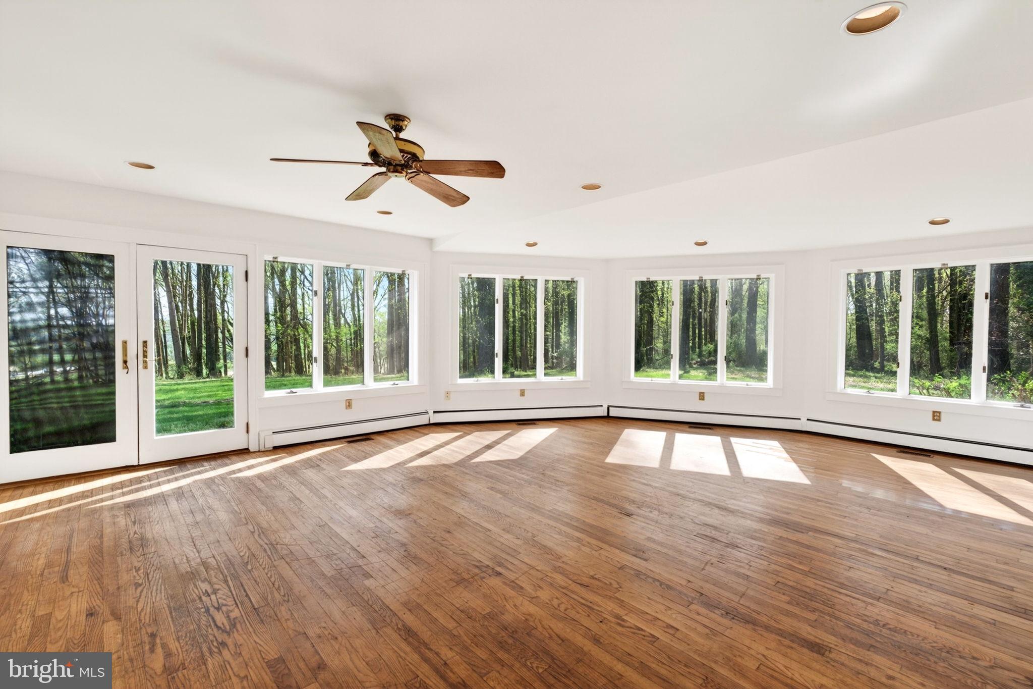 13009 Bottom Road Hydes, MD 21082 - Photo 42 of 97 Expansive windows flood this Sunroom!