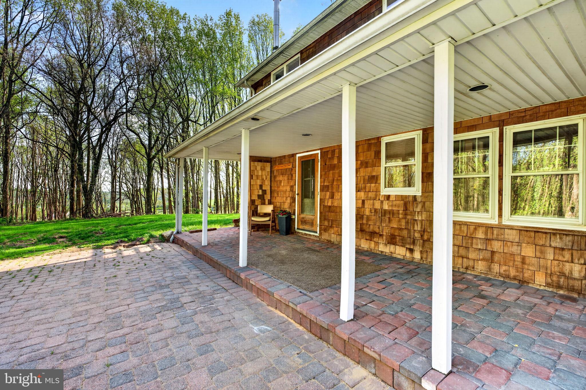 13009 Bottom Road Hydes, MD 21082 - Photo 82 of 97 another view- covered side porch