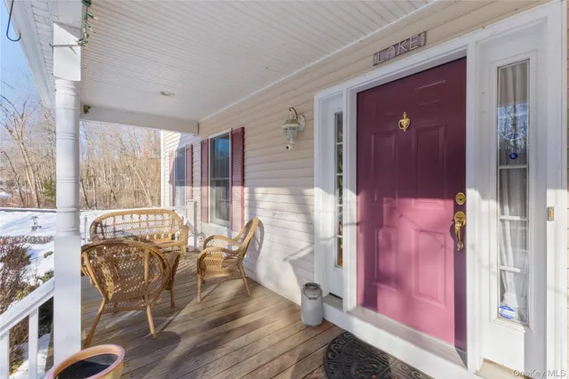 a living room with furniture and a gate