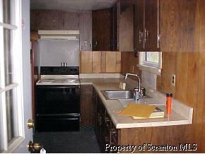 1278 Randolph Road Great Bend, PA 18821 - Photo 4 of 4 a kitchen with a sink and a stove