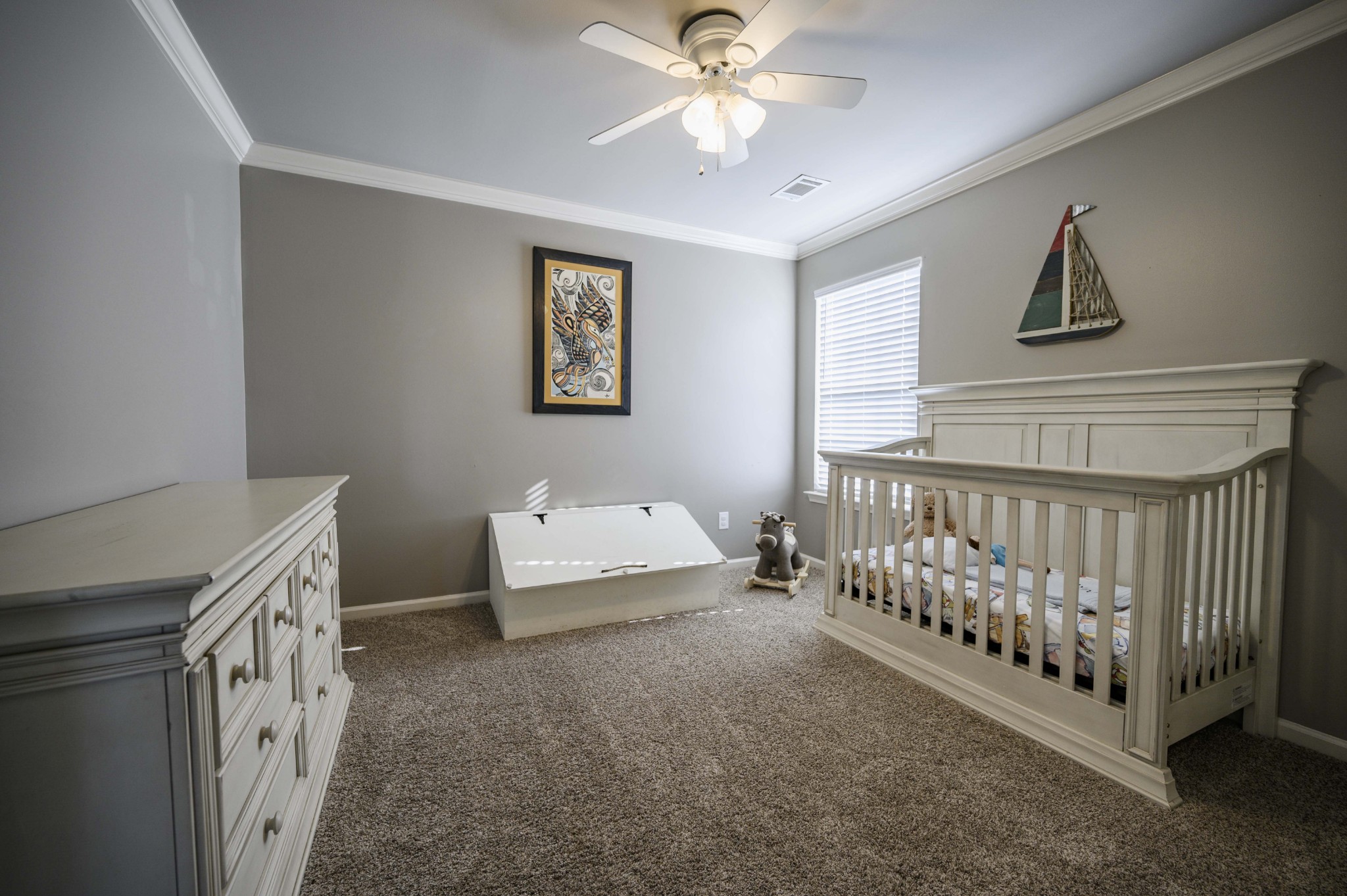 4561 Barfield Crescent Road Murfreesboro, TN 37128 - Photo 14 of 21 a bedroom with a bed and a chandelier