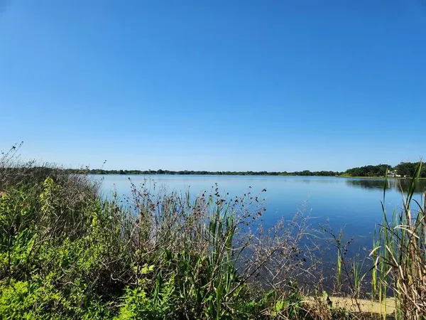 a view of an ocean with a yard