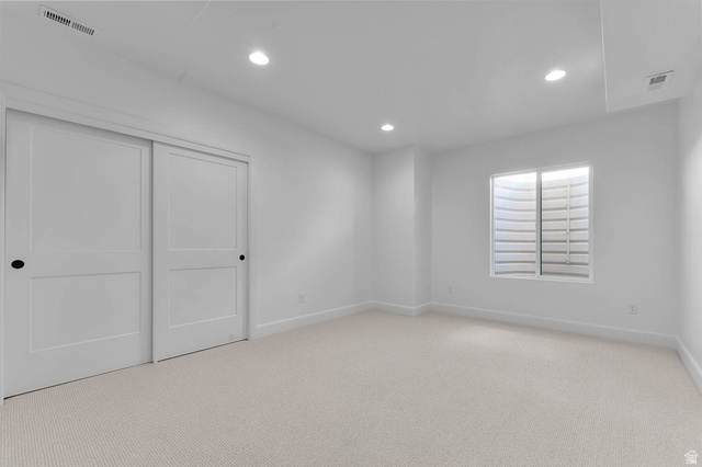 11711 South Halls Crk Road Draper, UT 84020 - Photo 26 of 31 Unfurnished bedroom with carpet, recessed lighting, and a closet