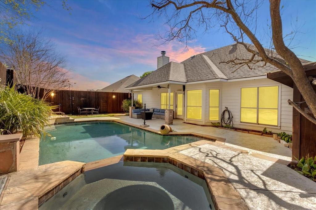 4905 Indio Lane Sherman, TX 75092 - Photo 1 of 36 a view of a house with swimming pool and sitting area