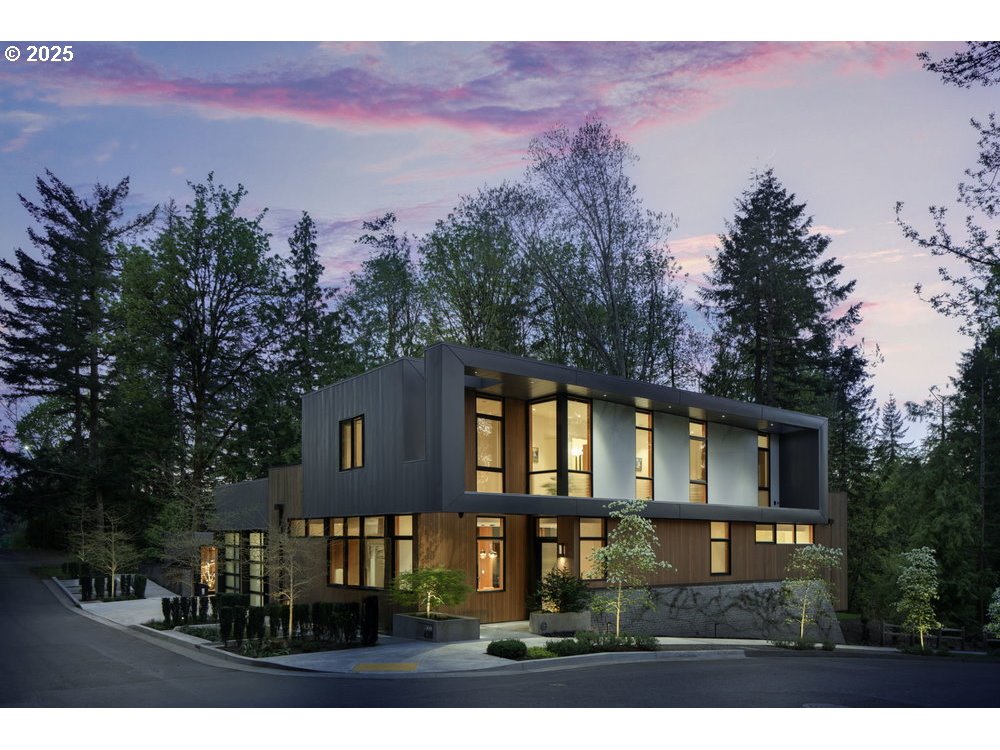4311 Southwest 36th Place Portland, OR 97221 - Photo 1 of 48 a front view of a house with a yard and mountain view