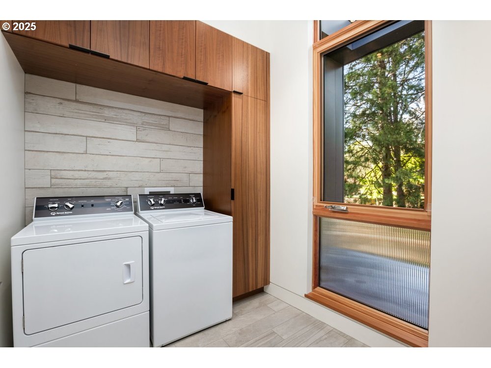 4311 Southwest 36th Place Portland, OR 97221 - Photo 45 of 48 a utility room with dryer and washer
