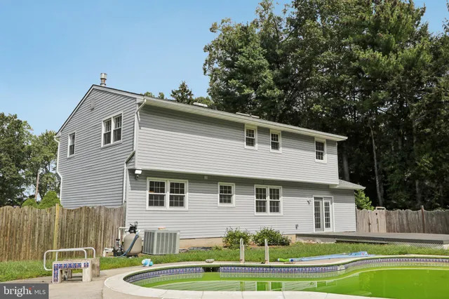 a view of a garden with an outdoor space