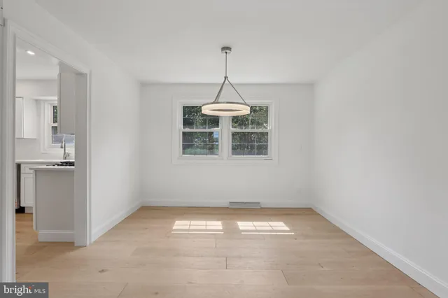 a view of a room with windows