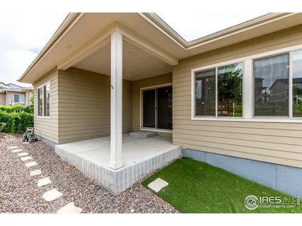 a view of a house with a fence