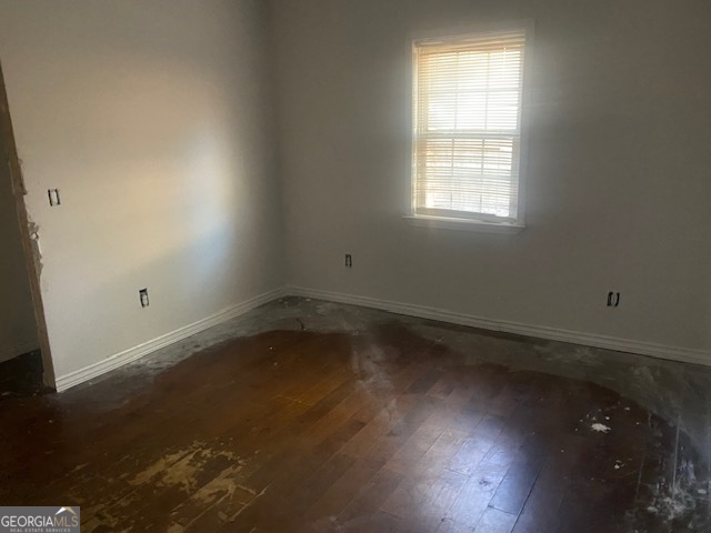 1573 Campbellton Road Southwest Atlanta, GA 30311 - Photo 11 of 22 an empty room with a window