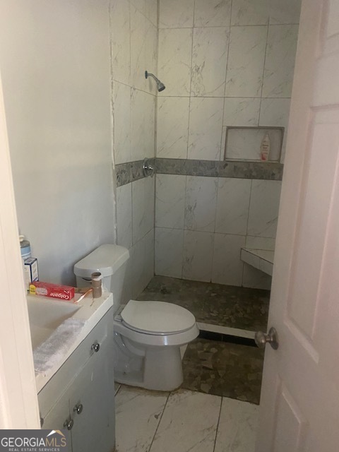 1573 Campbellton Road Southwest Atlanta, GA 30311 - Photo 14 of 22 a bathroom with a toilet and a shower