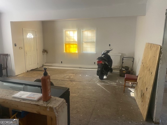 1573 Campbellton Road Southwest Atlanta, GA 30311 - Photo 19 of 22 a living room with furniture and a window