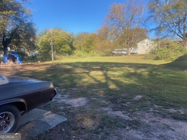 1573 Campbellton Road Southwest Atlanta, GA 30311 - Photo 2 of 22 a view of a yard with an outdoor space