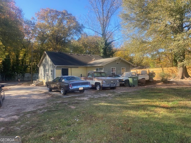 1573 Campbellton Road Southwest Atlanta, GA 30311 - Photo 3 of 22 a view of a house with truck parked in a yard