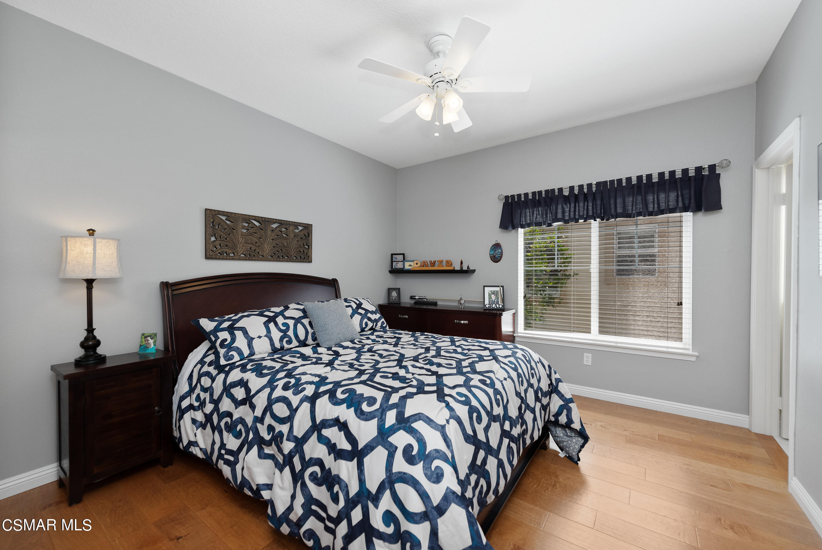 128 Laurel Ridge Drive Simi Valley, CA 93065 - Photo 30 of 66 a bedroom with a large bed and a window
