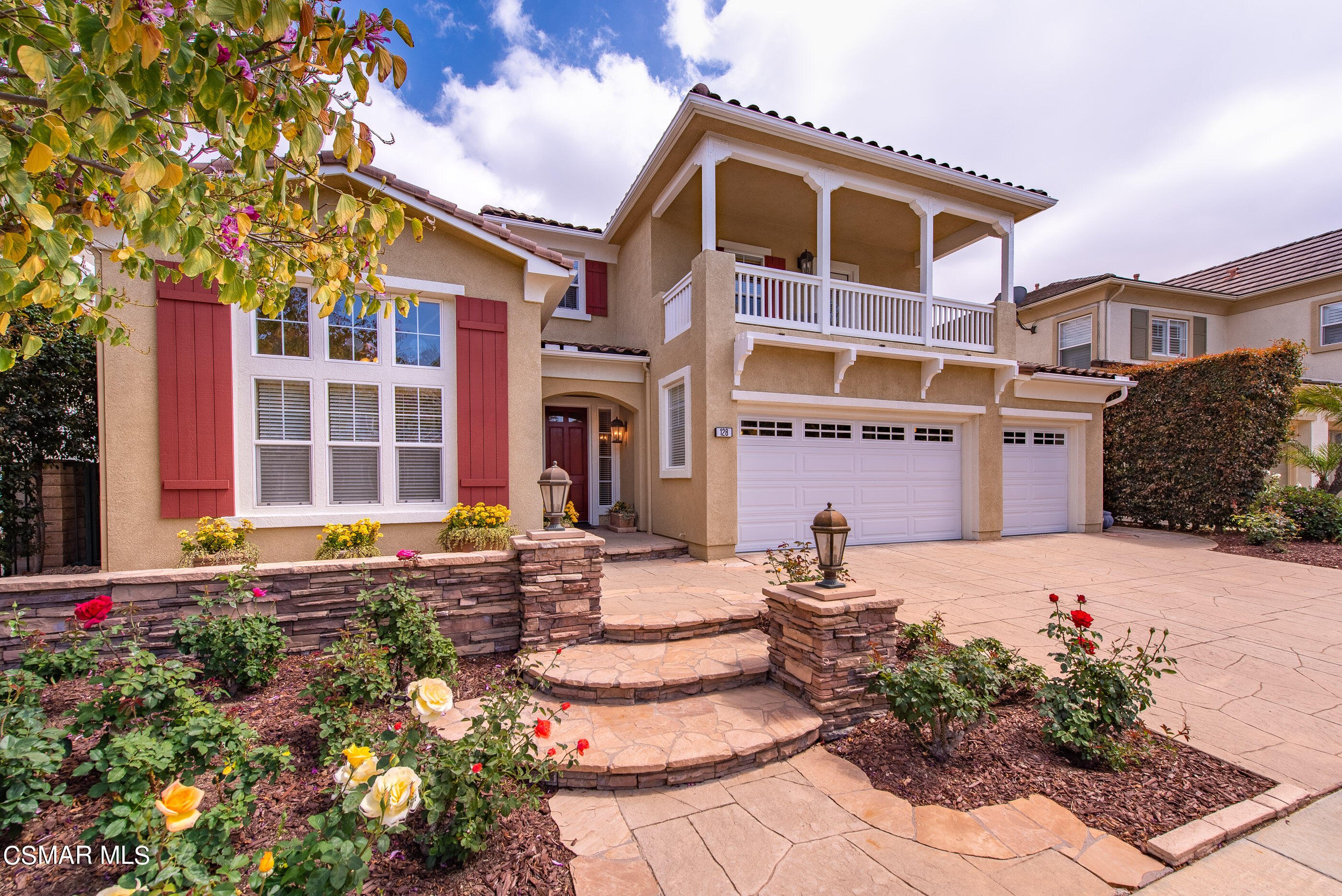 128 Laurel Ridge Drive Simi Valley, CA 93065 - Photo 3 of 66 a front view of a house with a yard