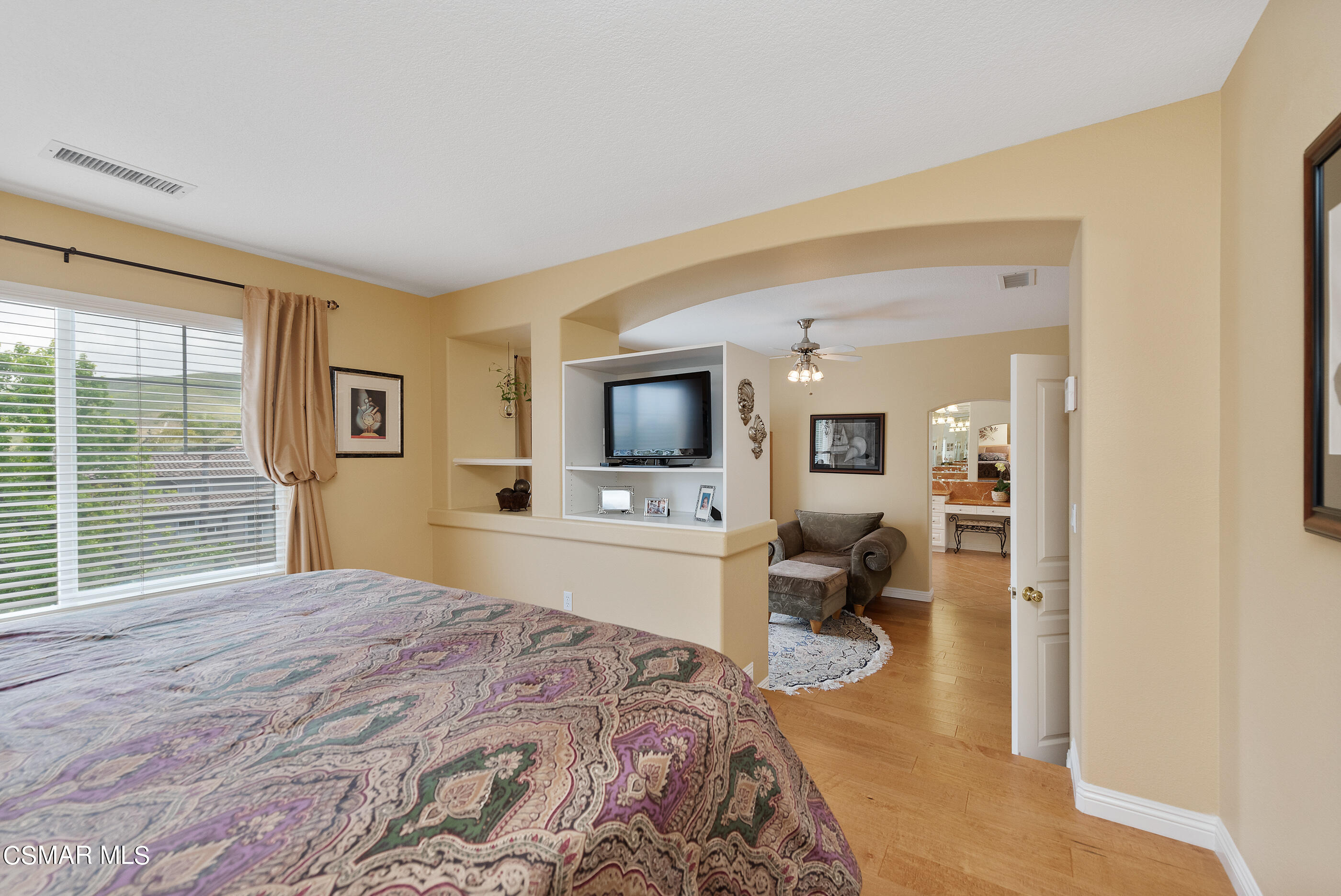128 Laurel Ridge Drive Simi Valley, CA 93065 - Photo 42 of 66 a bedroom with a large bed and a tv