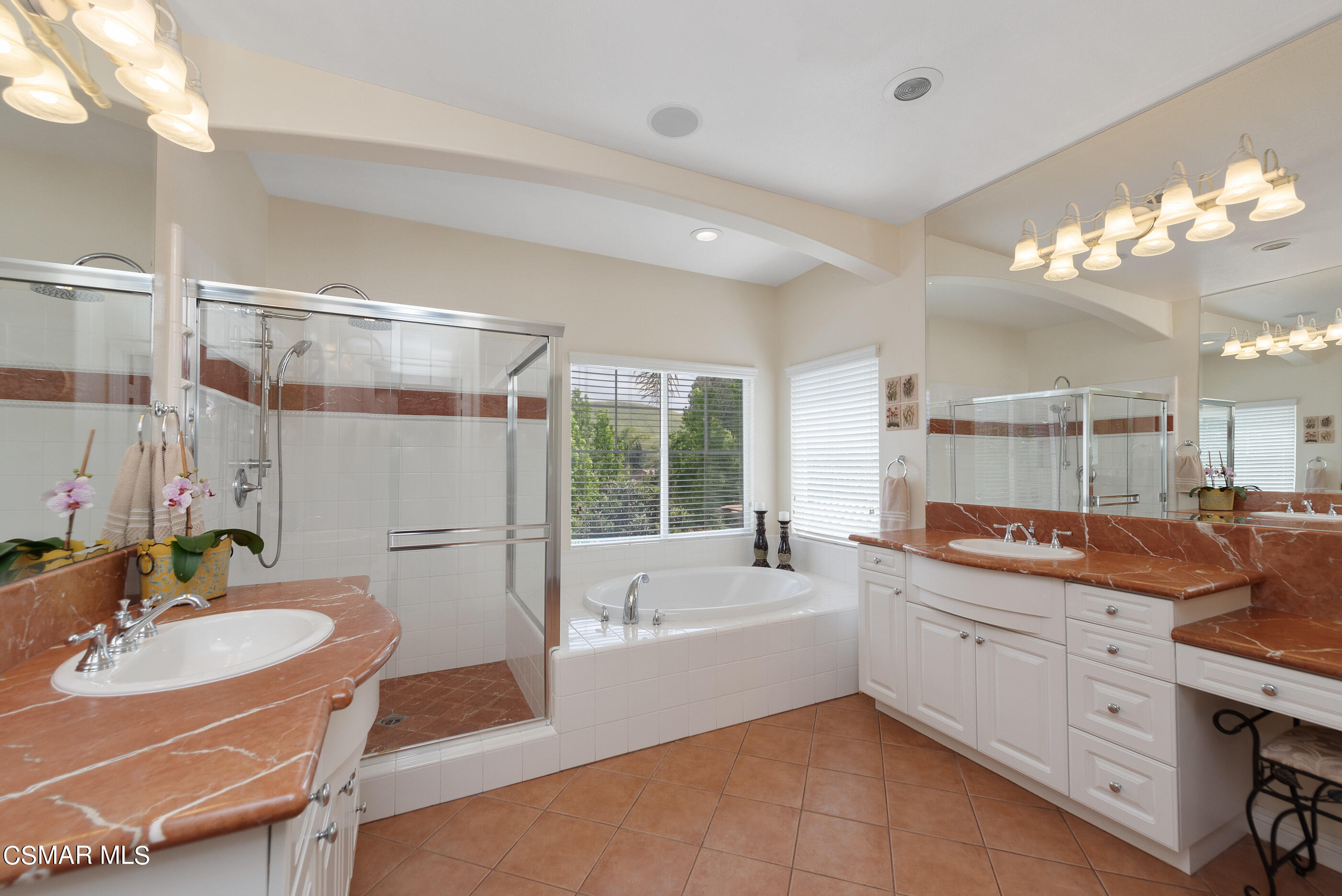 128 Laurel Ridge Drive Simi Valley, CA 93065 - Photo 43 of 66 a bathroom with a granite countertop sink mirror and a bathtub