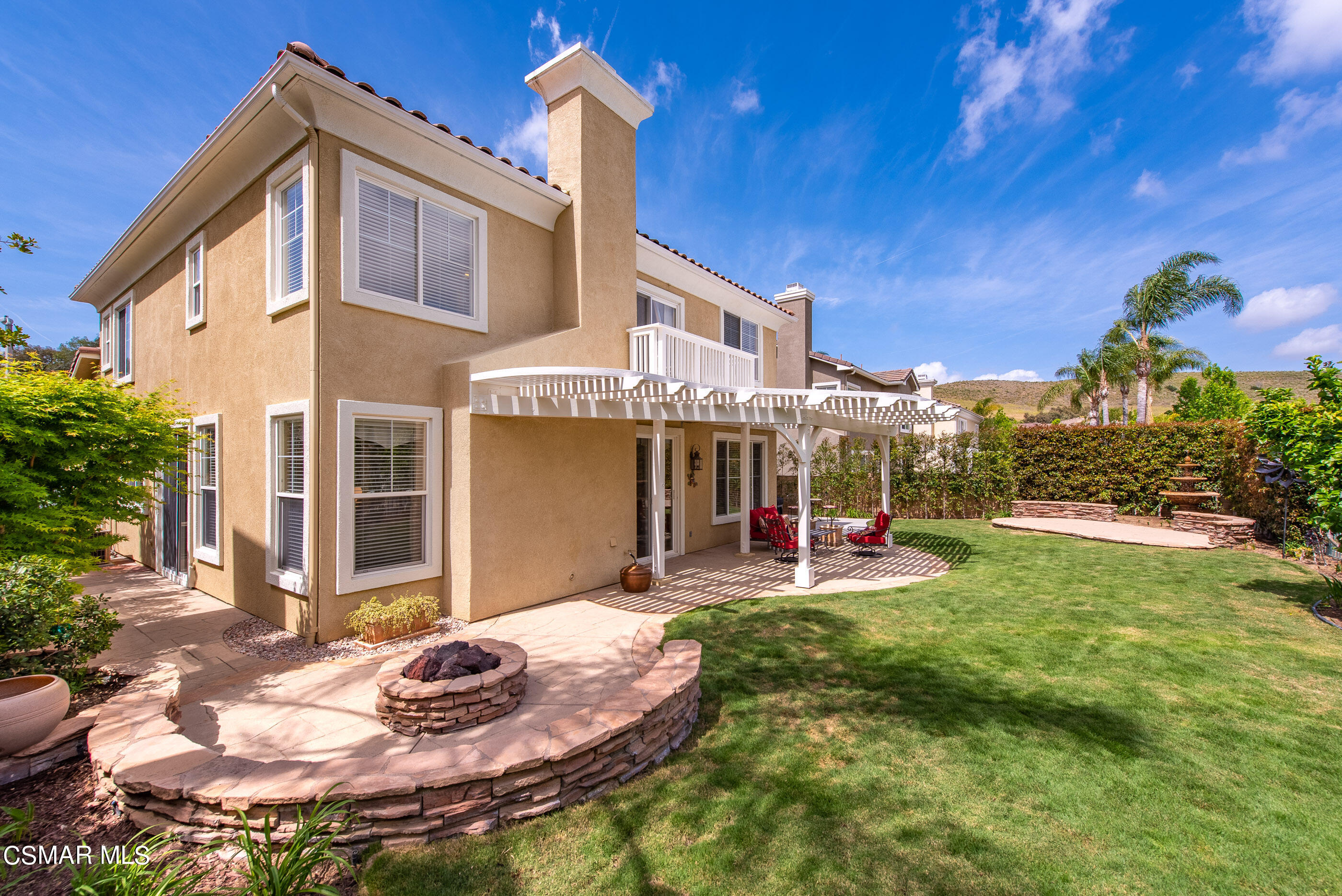 128 Laurel Ridge Drive Simi Valley, CA 93065 - Photo 56 of 66 a view of a house with backyard porch and sitting area