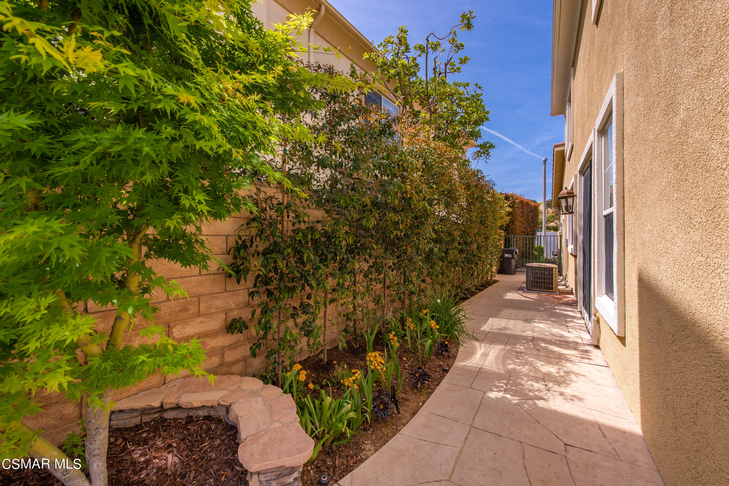 128 Laurel Ridge Drive Simi Valley, CA 93065 - Photo 59 of 66 a view of a pathway both side of house