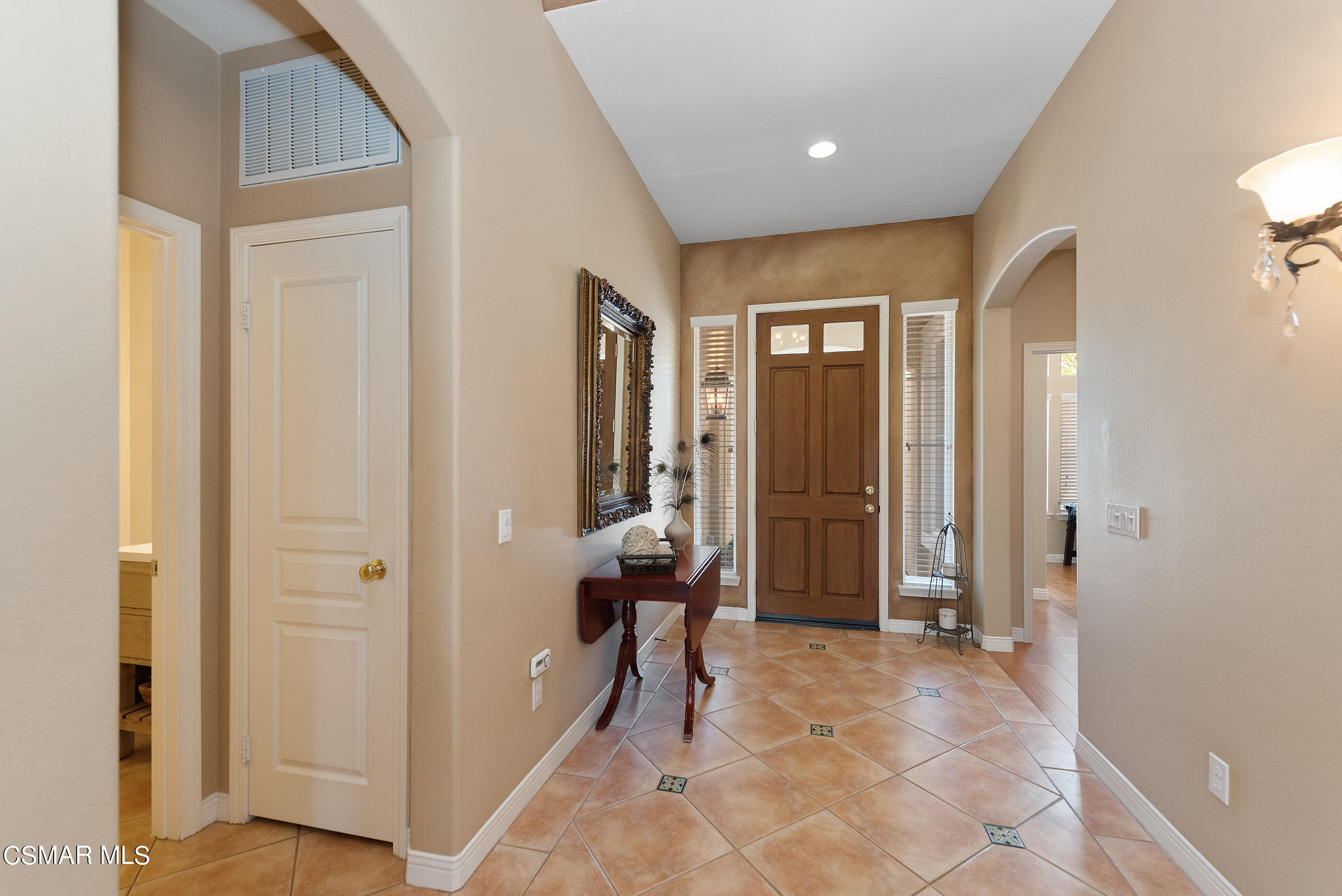 128 Laurel Ridge Drive Simi Valley, CA 93065 - Photo 6 of 66 a view of a hallway with windows and closet