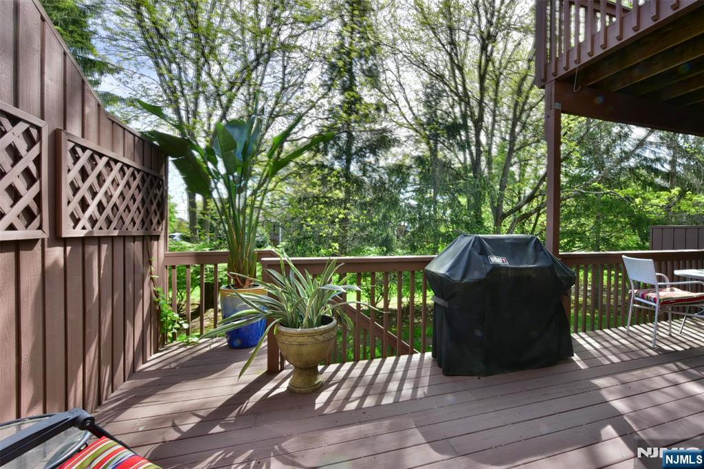 41 Litchult Lane Mahwah, NJ 07430 - Photo 18 of 50 a view of a two chairs in the deck