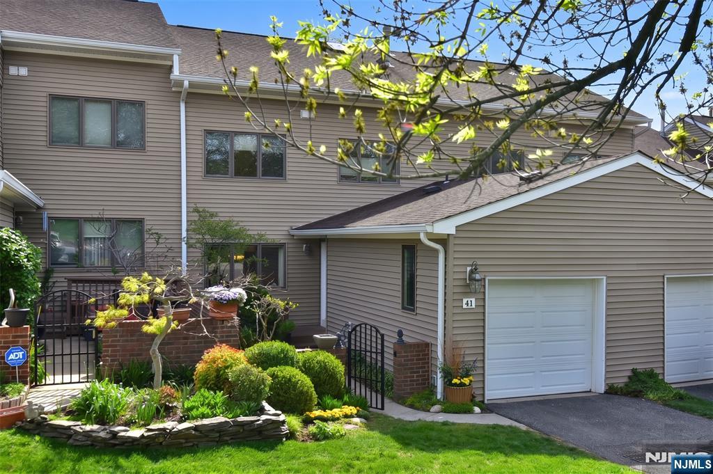 41 Litchult Lane Mahwah, NJ 07430 - Photo 2 of 50 a front view of a house with yard