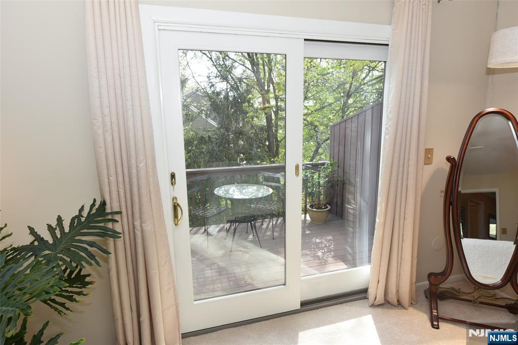 41 Litchult Lane Mahwah, NJ 07430 - Photo 22 of 50 a room with balcony and furniture